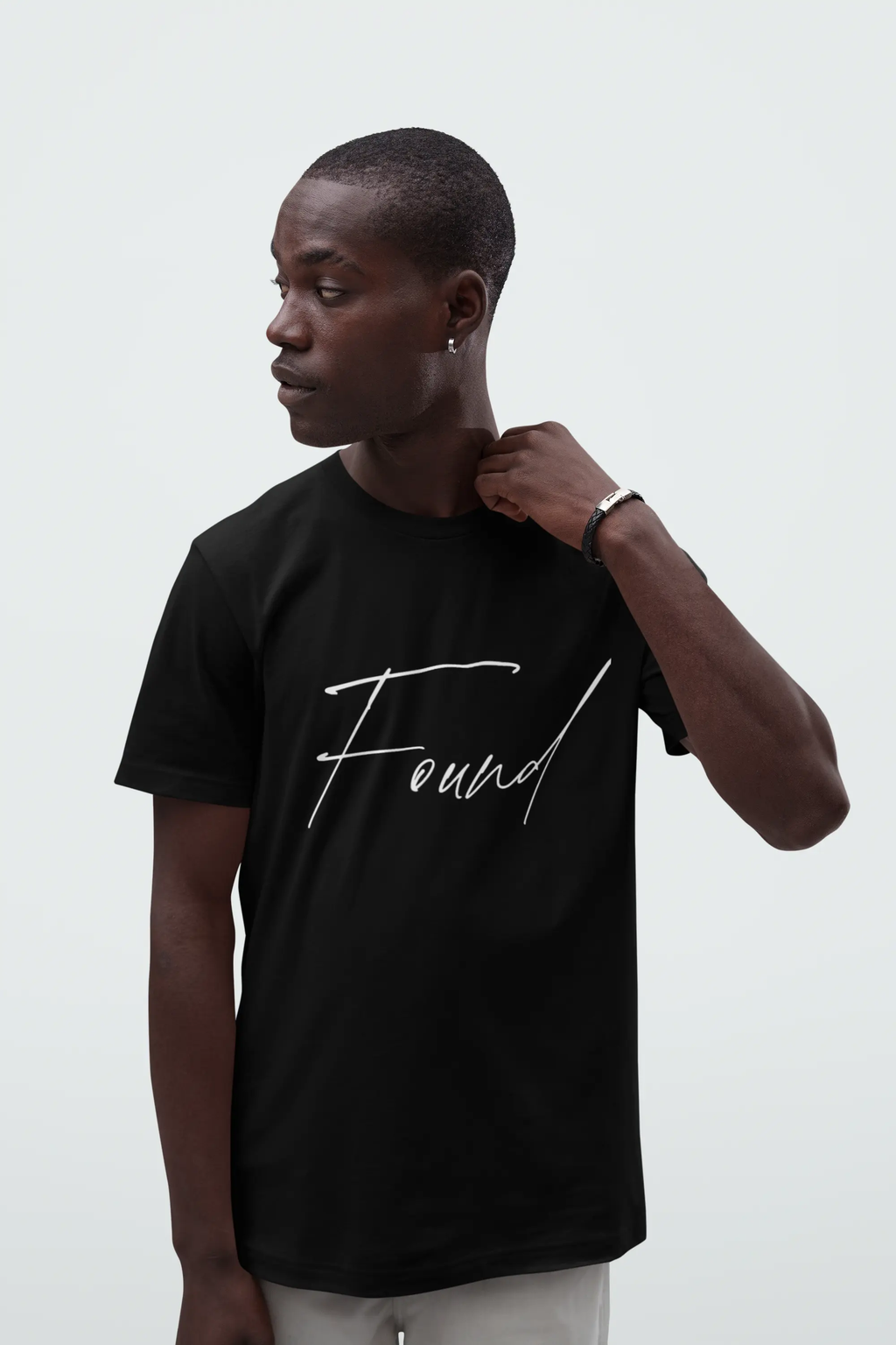 man wearing Found tee, black, unisex fit, faith Christianity faith apparel, Christian streetwear
