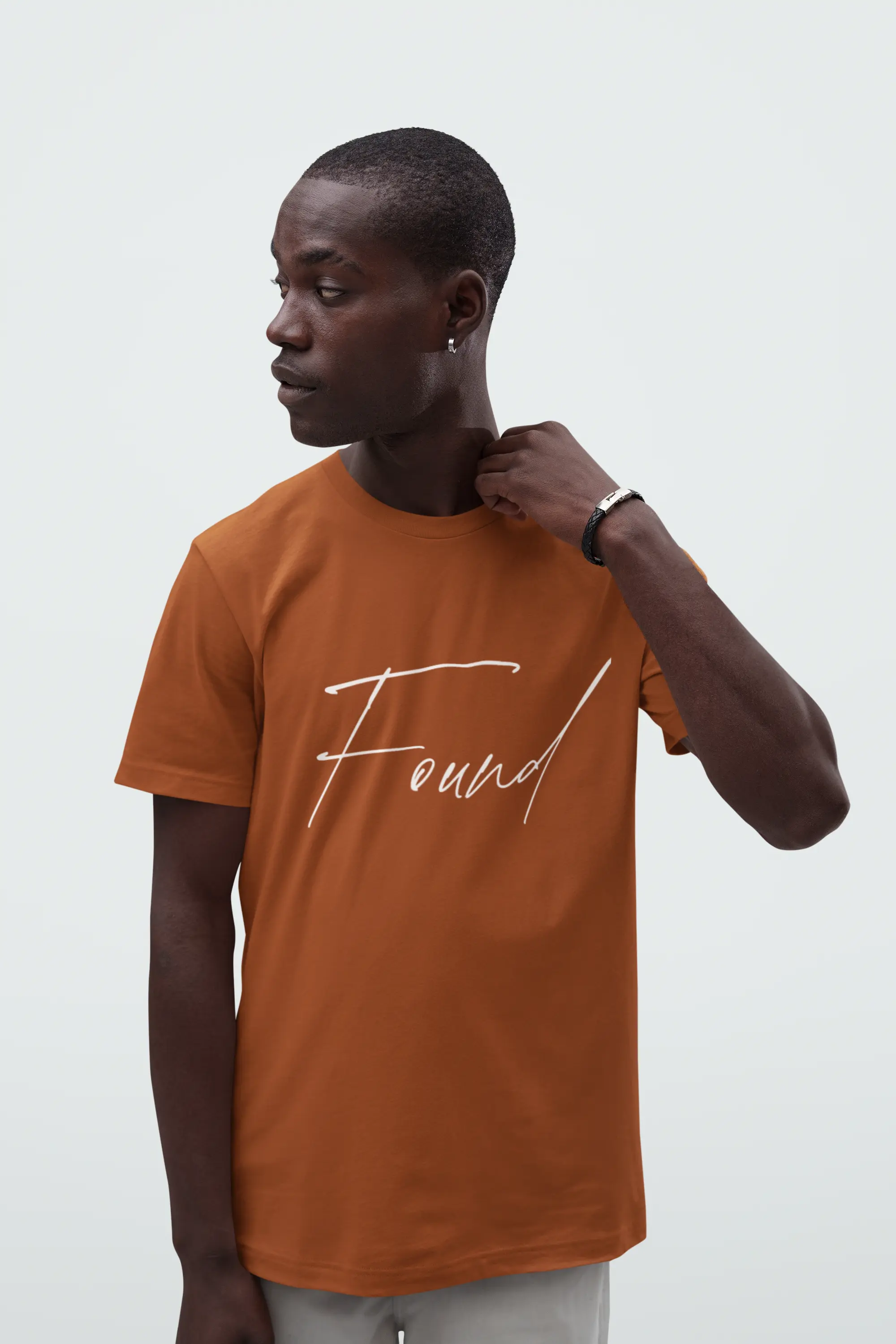 person wearing found tee, autumn color, unisex fit, faithful christian apparel, Christian bible verse shirt 
